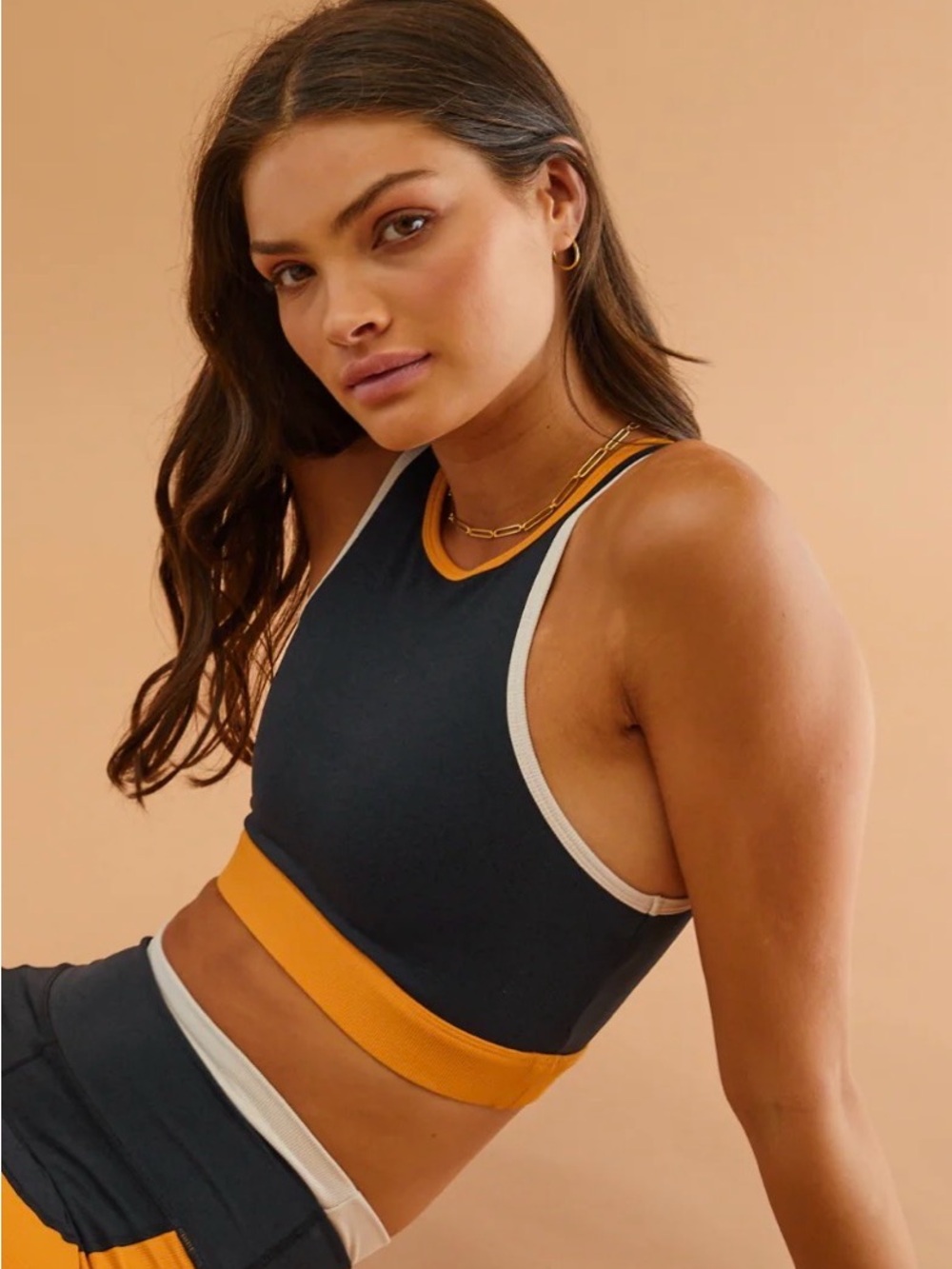 WILO The Label- High-Neck Colorblock Sports Bra in black and Mustard